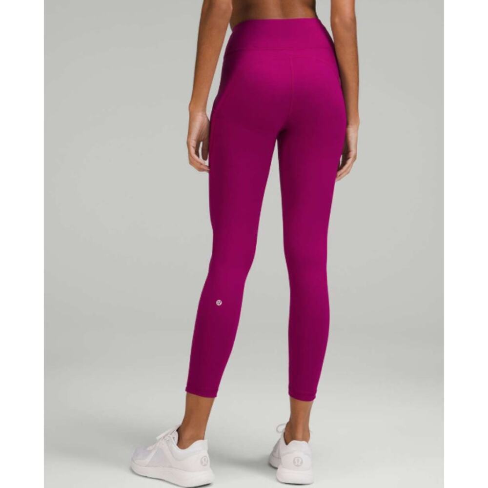 LULULEMON Invigorate High Rise Legging in Magenta Purple Size 4 casual running